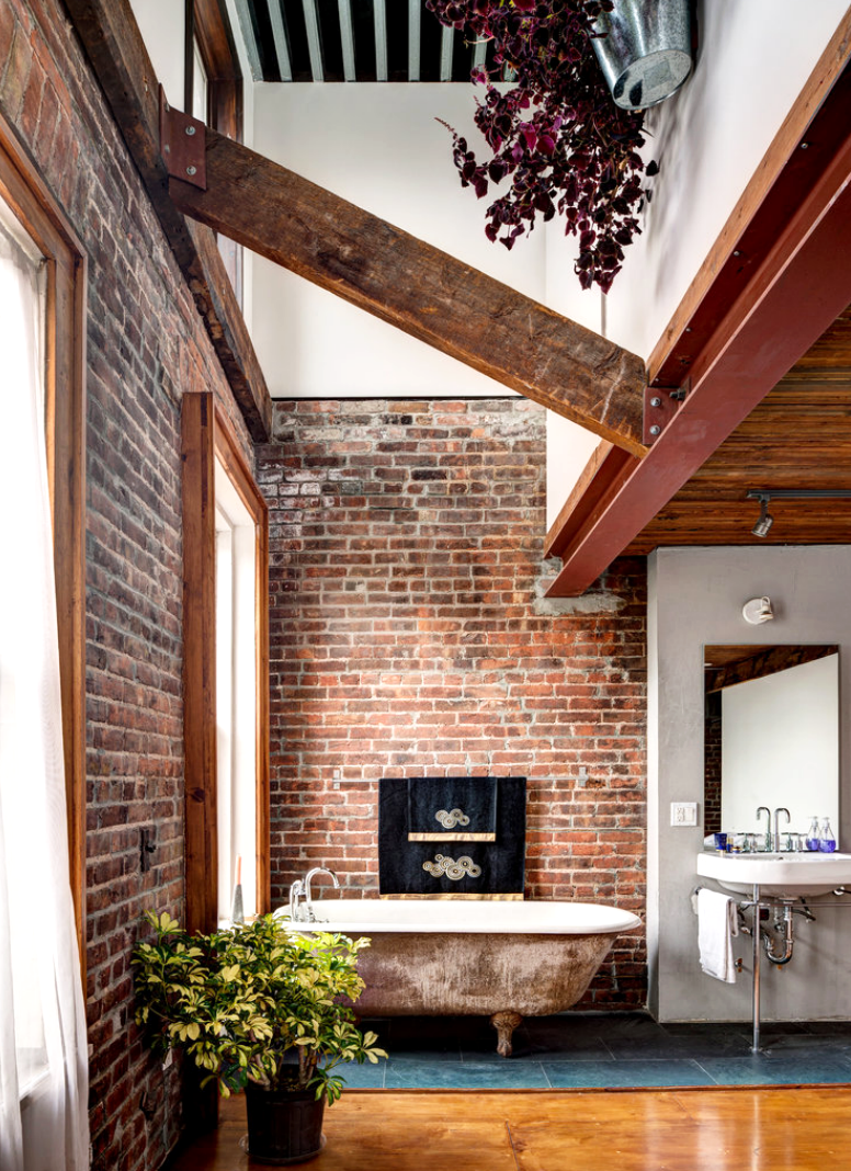 Get an industrial style home by using exposed brick walls