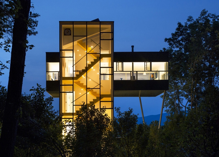 "Tower House — a 2,500 square foot structure on a sloping, wooded site in Ulster County, New York, about 100 miles north of Manhattan was designed by New York City – based Gluck+ as the mountain retreat for one of the firm's principals, Thomas Gluck and his family"