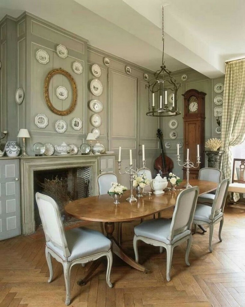 Boiserie paneling frames a collection of Creil plates. The Dining room ...