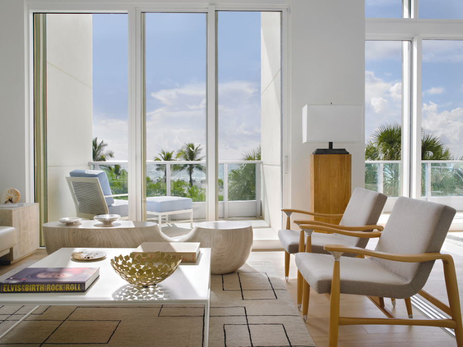 High-end Residential Projects by Michael Wolk - South Beach Townhouse - Living room in neutral tones and plenty sunlight