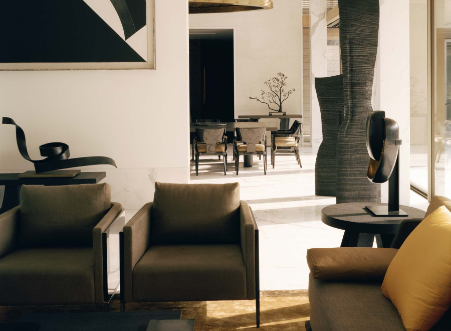 Modern Interior Design Projects by Christian Liaigre. Modern Living Room with neutral tones armchairs.