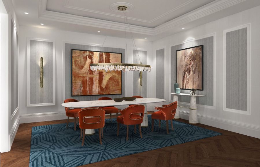 modern dining room with oval marble dining table, orange dining chairs and blue area rug