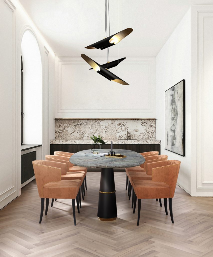 modern dining room design with orange velvet chairs