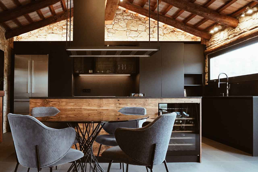 black kitchen by franquet barrau with grey chairs, black table.