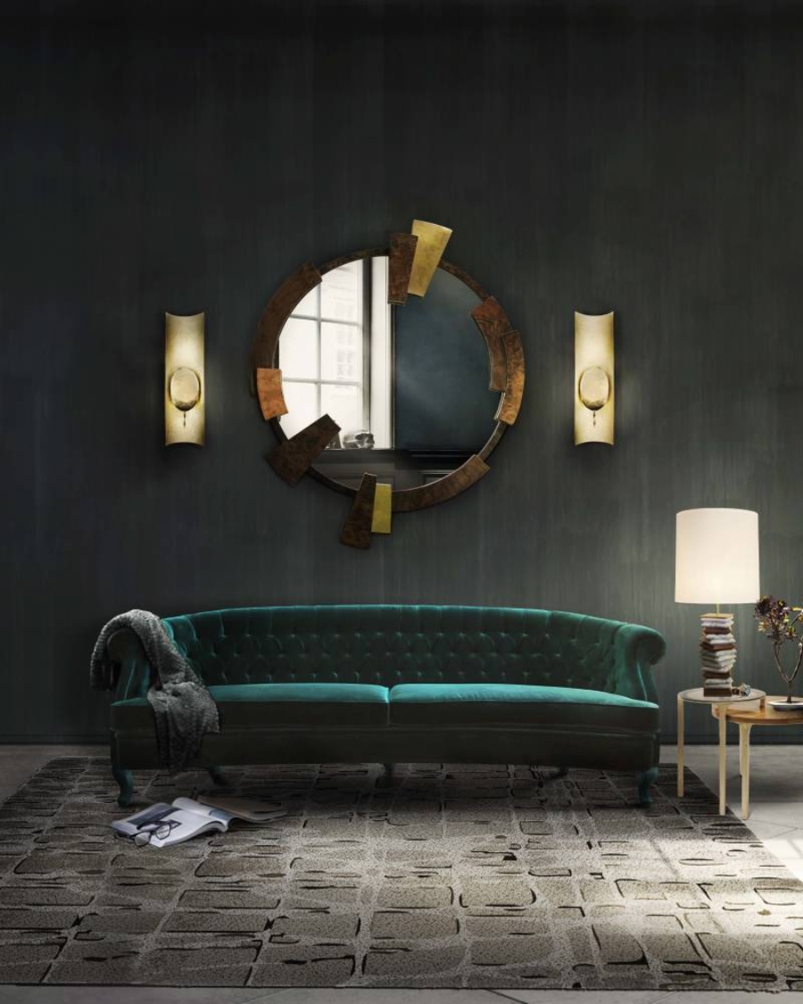 Modern Contemporary Interior Design by Fleur-de-lis Interior Design. The impressive living room velvet MAREE Sofa has a modern flair and stands out with the help of the PANJI Wall Light and the KAAMOS Round Mirror that offer a touch of strength and class to your modern interior design.