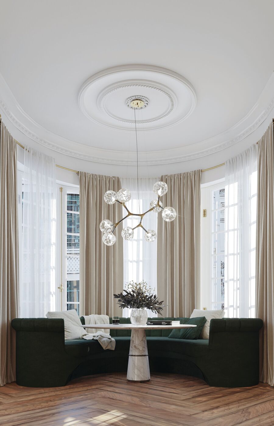 dining room with round sofa
