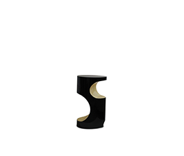 Bryce is a small side table with unique and unusual forms. Its body is made in black laquered fiberglass and high gloss golden leaf.