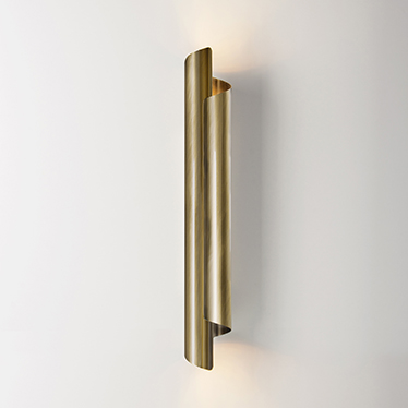 Cyrus was the brave Persian king that conquered Babylonia and its Cylinder was the document that proves it. CYRUS wall light was inspired by the freedom and the vast culture of the Persian civilization. An original furniture piece, made in polished brass.
